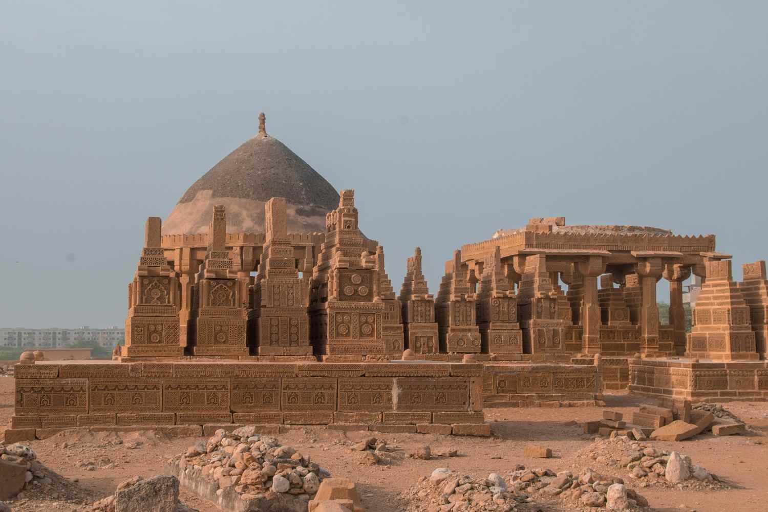 Carved sandstone tombs and a domed pavilion at Chaukhandi